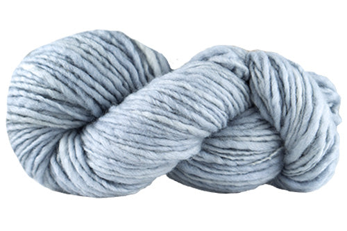 Soft wool yarn in powder color from Manos del Uruguay Wool Clásica collection, displayed in a close-up shot.