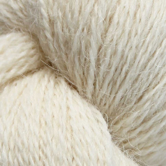 Cream-colored Eden 4-Ply yarn by Baa Ram Ewe, showcasing soft, four-ply wool yarn with a smooth texture.