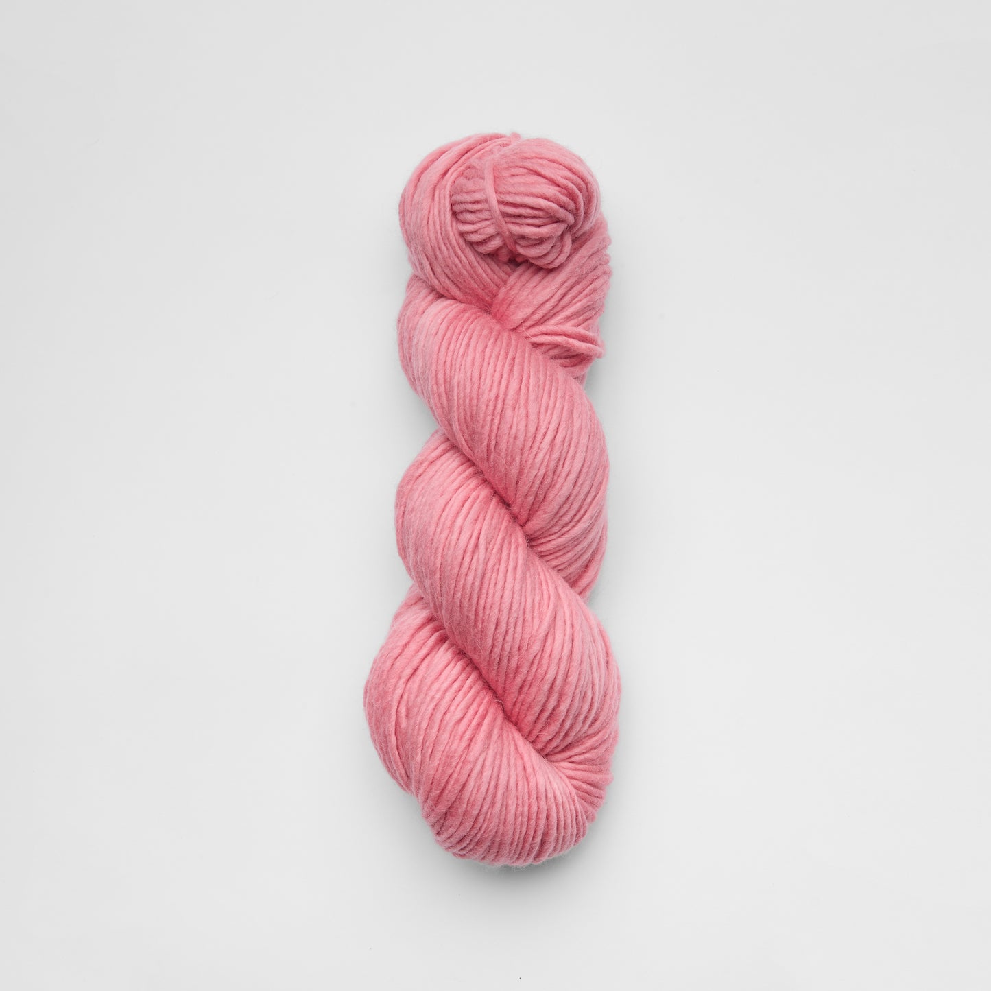 Kinua The Skinny Luxury Blend yarn in pink, lemon, and skin tones, showcasing its soft, colorful fiber texture and high-quality craftsmanship.