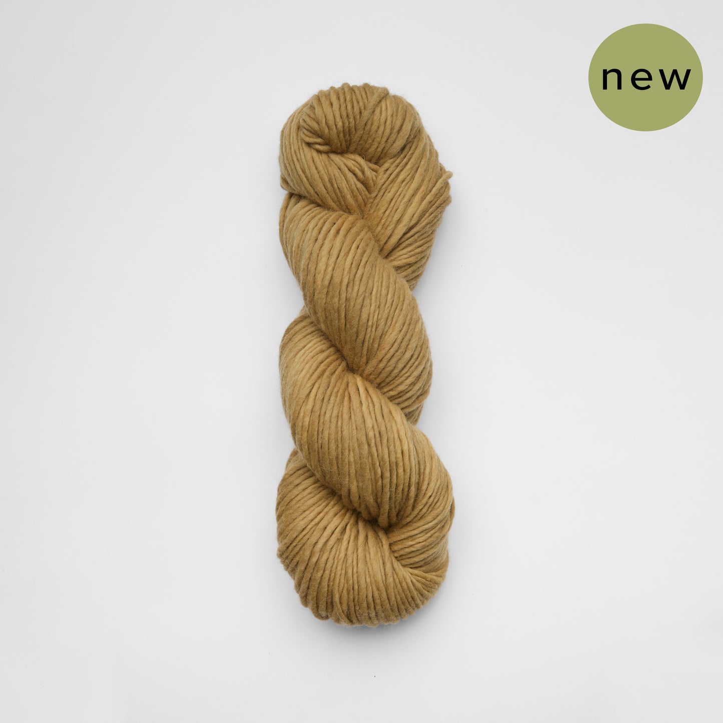 Kinua The Skinny Luxury Blend yarn in soft, neutral tones, showcasing its smooth texture and high-quality fiber.
