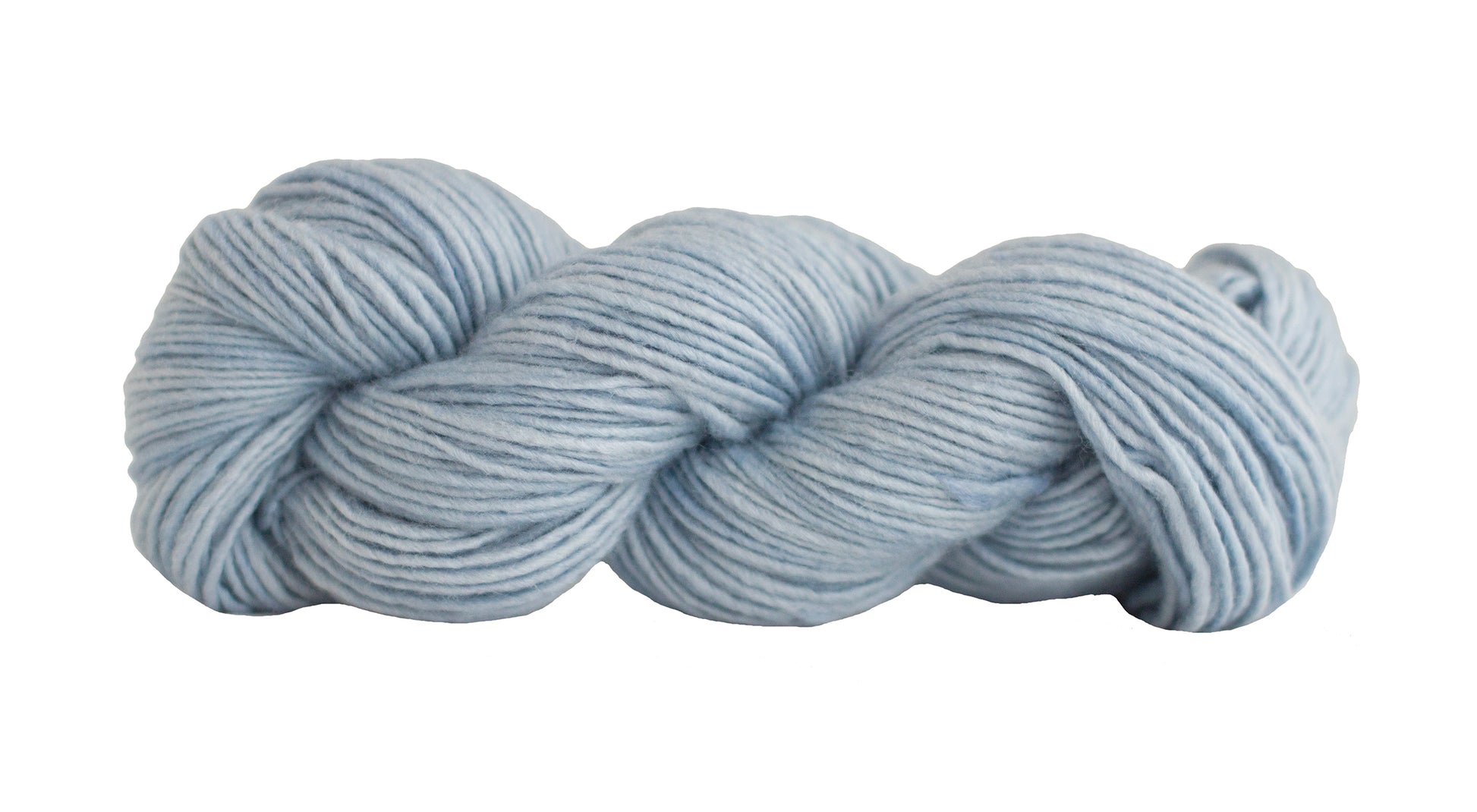 Soft silk blend yarn from Manos del Uruguay in powder color, showcasing its smooth texture and vibrant hue.