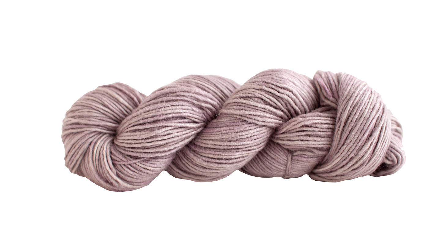 Manos del Uruguay Silk Blend yarn in Shale color, showcasing soft, luxurious fiber with a subtle variegated pattern.