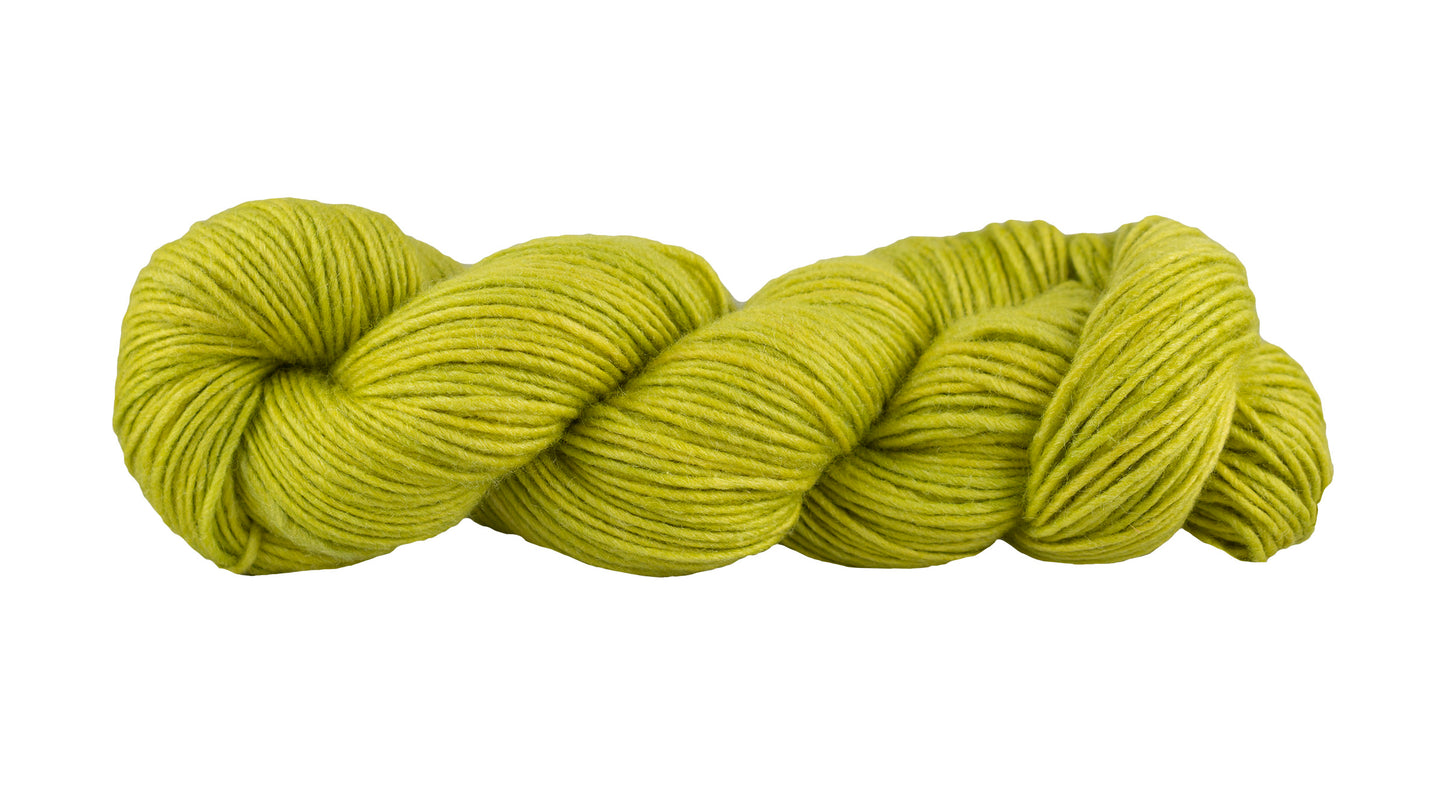 Manos del Uruguay Silk Blend yarn in spirulina green, showcasing soft, luxurious fiber with a smooth texture.