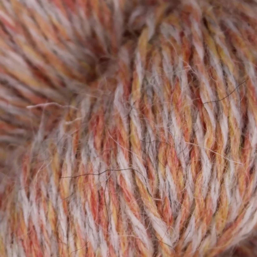 Faded peach British Breeds yarn by Baa Ram Ewe showing soft, textured wool yarn for knitting or crochet projects.