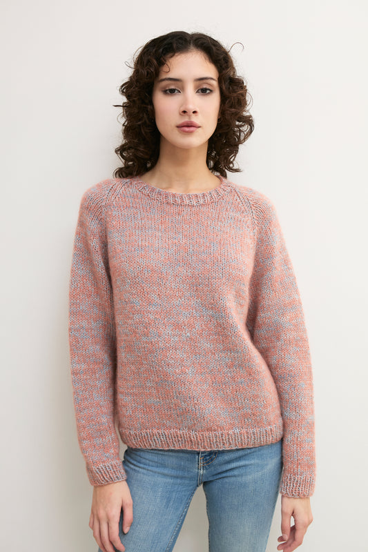 Patterned Mist Sweater by KINUA featuring a cozy, intricate knit design in natural tones, shown on a mannequin.