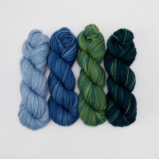 Soft, luxurious Kinua The Skinny Luxury Blend yarn showcasing its smooth texture and vibrant color in a close-up shot.