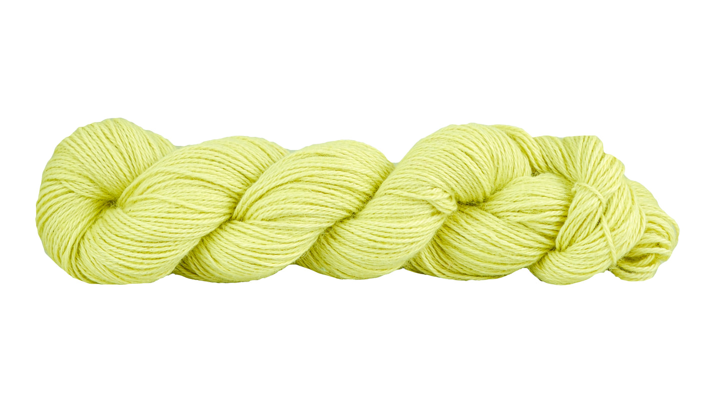 Fairmount Fibers Serena yarn in Citron color, close-up shot showing soft, textured fiber strands and vibrant yellow hue.