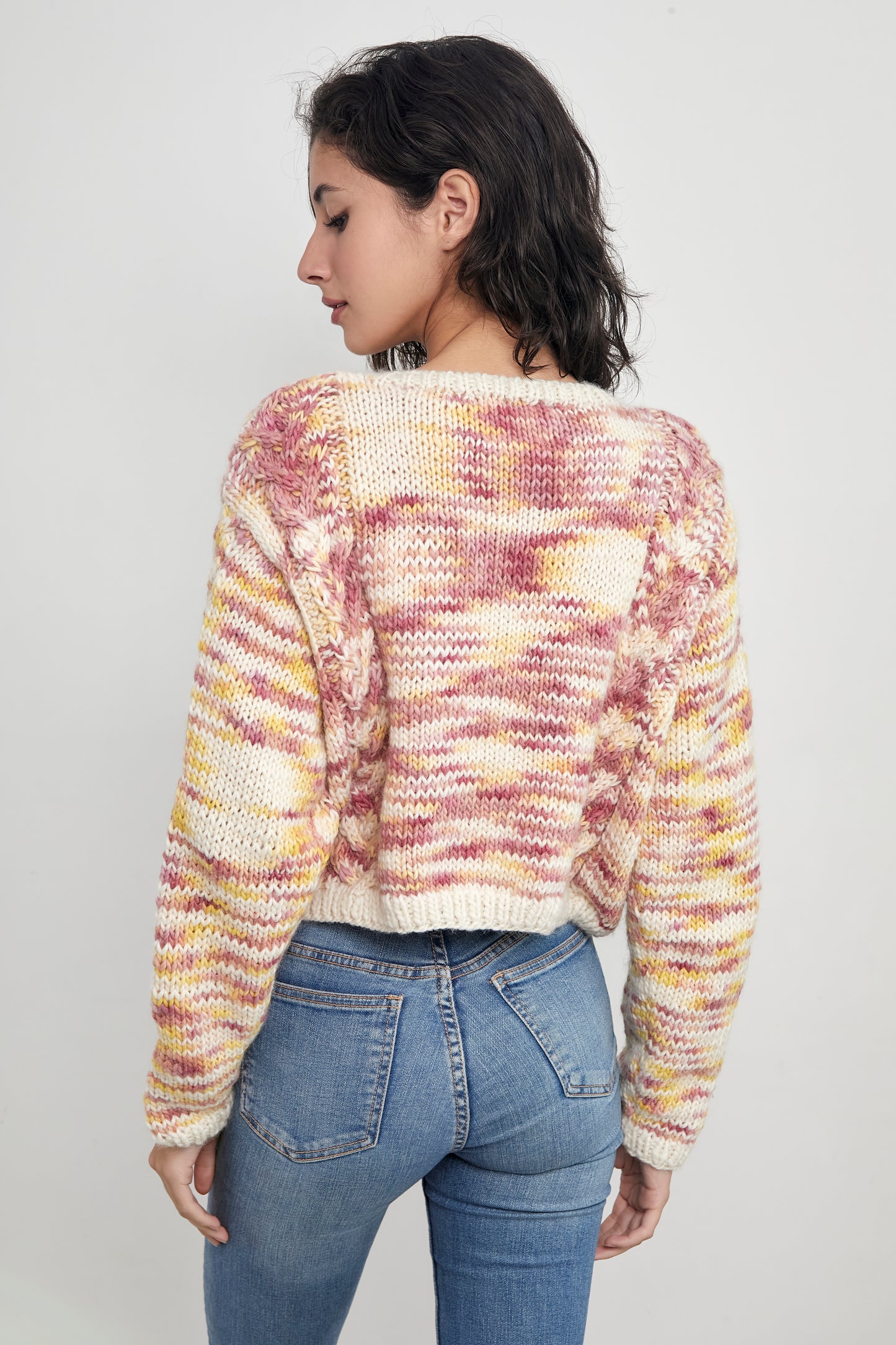 Patterned Kinua Monet Cardigan in Venecia Color, featuring intricate knit design and cozy fit, showcased in the product image.