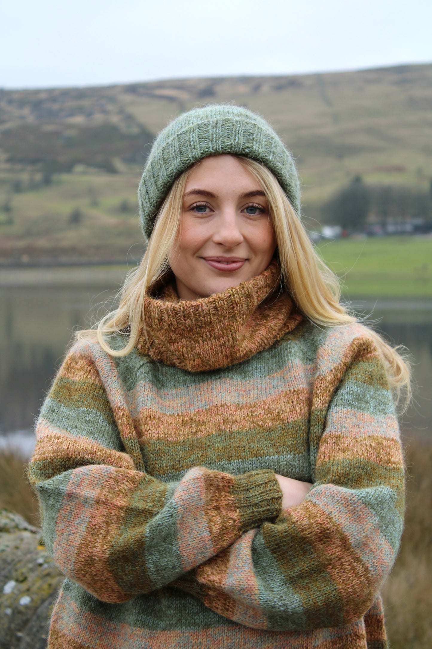 Wren hat and cowl pattern by Baa Ram Ewe, featuring a cozy knit design in soft, neutral yarns displayed on a flat lay.