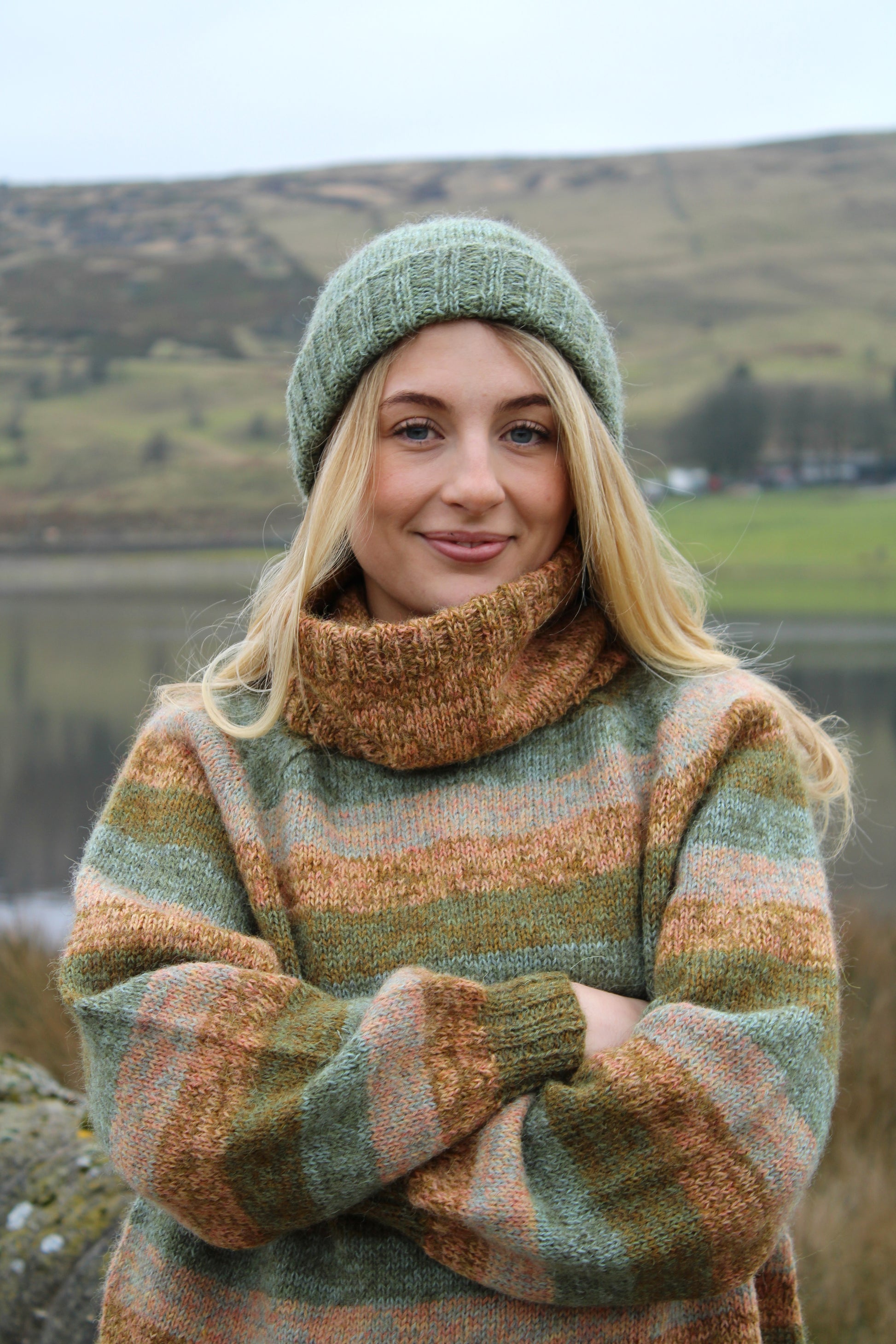 Wren hat and cowl pattern by Baa Ram Ewe, featuring a cozy knit design in soft, neutral yarns displayed on a flat lay.