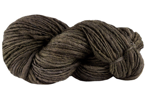 Cozy coffee-colored wool yarn from Manos del Uruguay Wool Clásica, showcasing soft, textured skein for knitting or crochet projects.