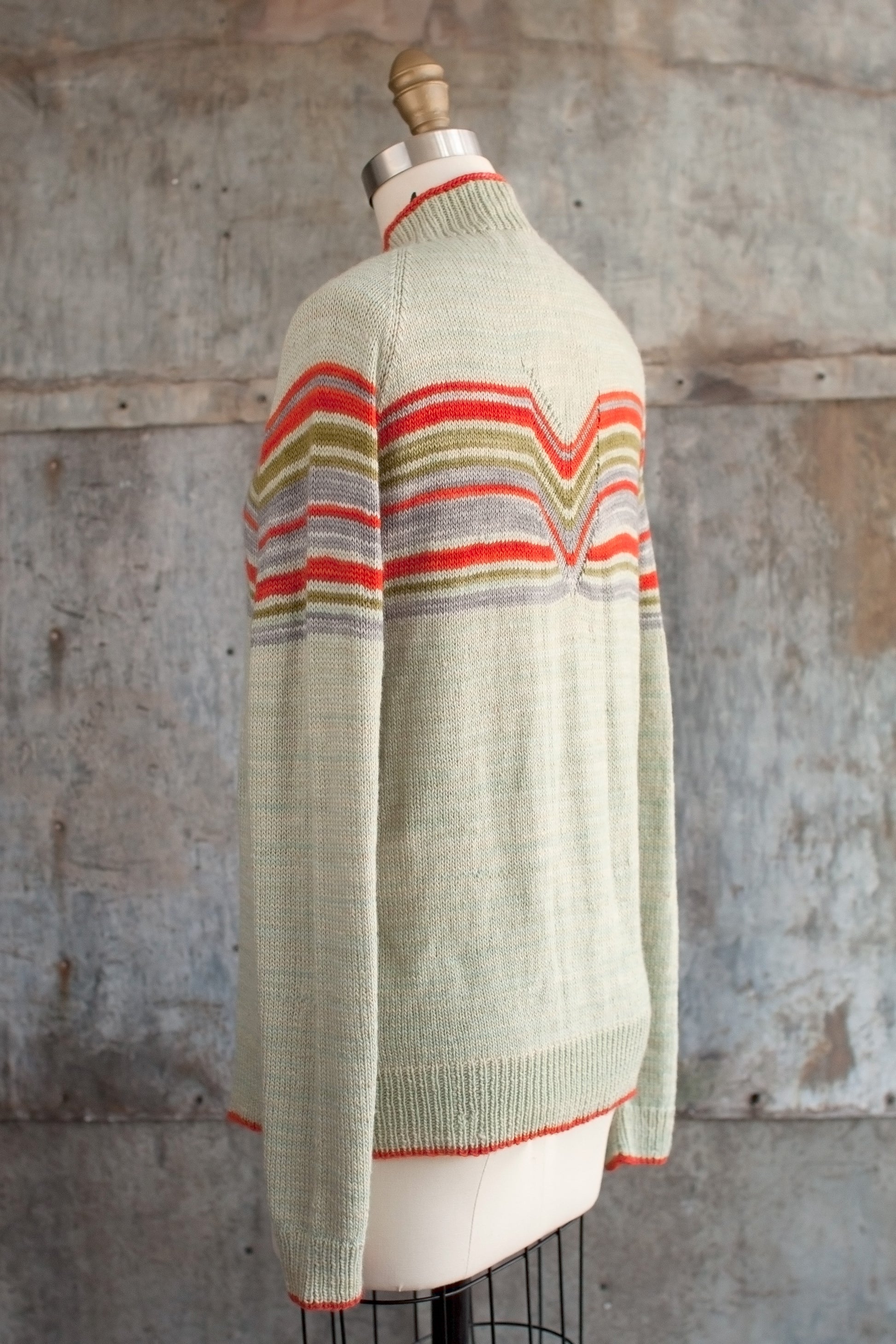 Fairmount Fibers Pheon 2015K pattern in vibrant colors, showcasing intricate yarn design on a neutral background.