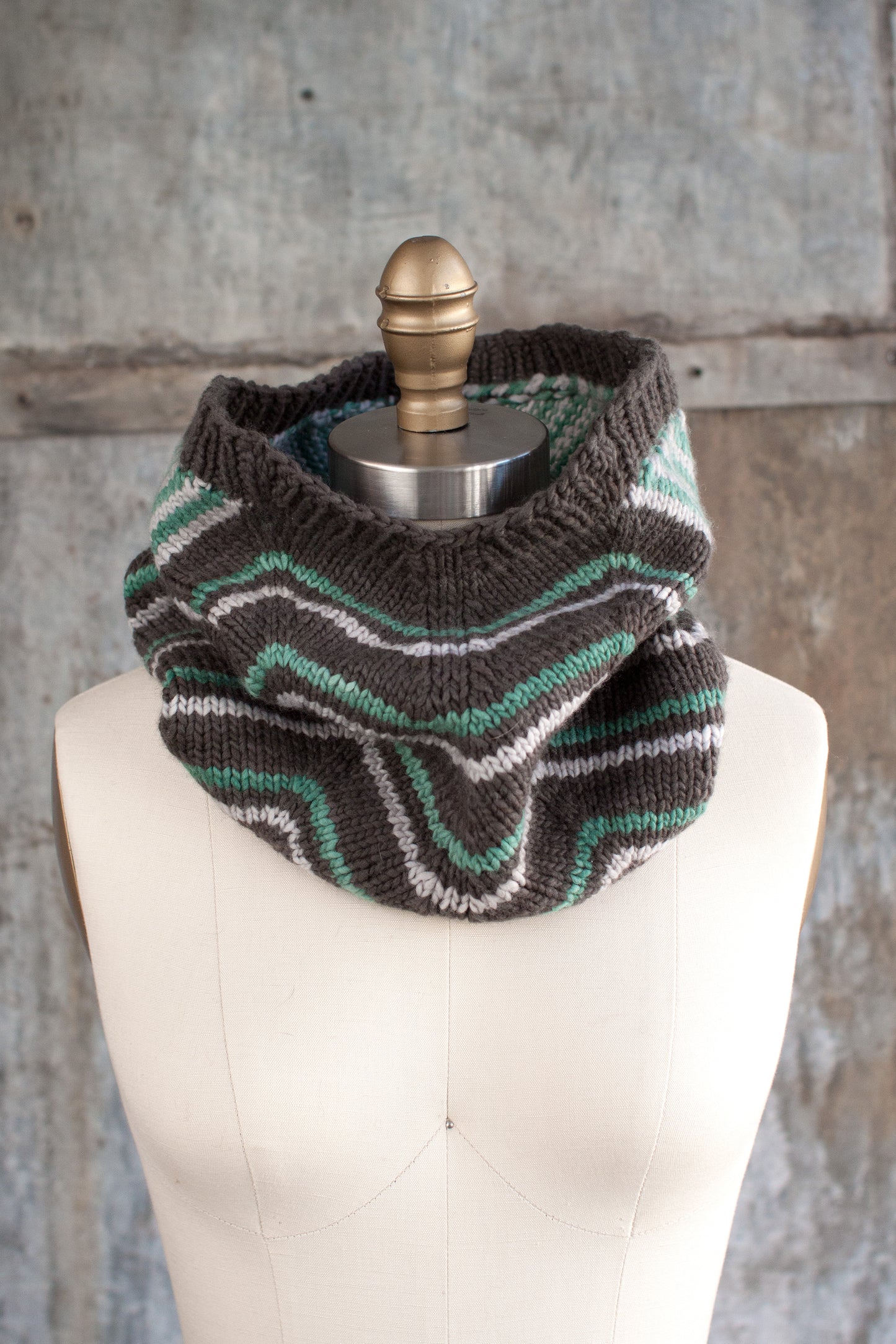 Fairmount Fibers Quoin 2015P pattern in vibrant colors, showcasing intricate knitting design on a textured background.