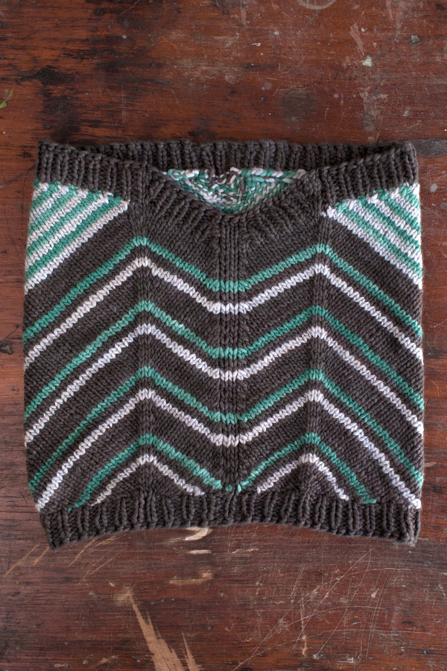 Close-up of Fairmount Fibers Quoin 2015P pattern yarn in vibrant colors, showcasing intricate pattern detail and texture.