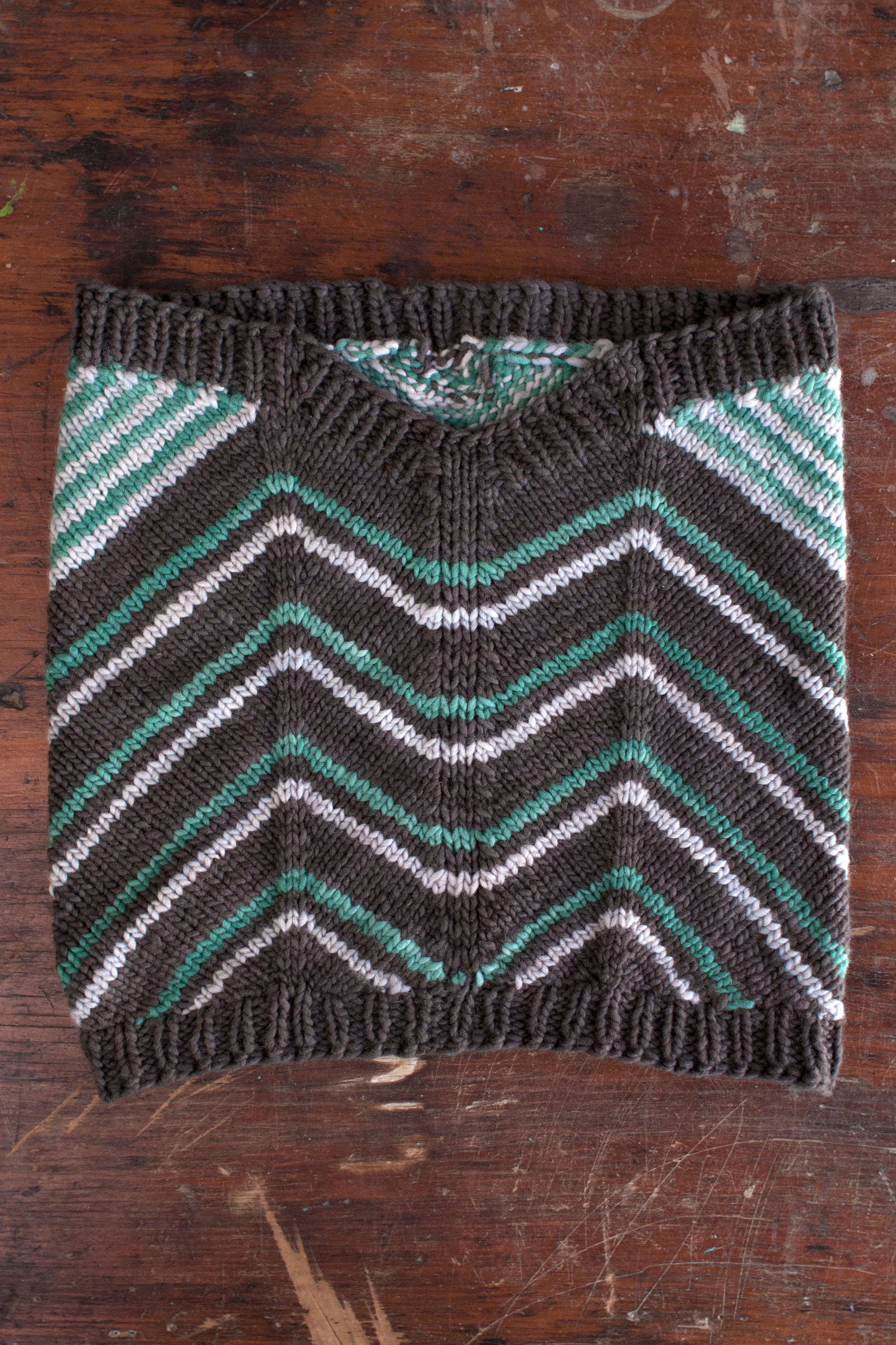 Close-up of Fairmount Fibers Quoin 2015P pattern yarn in vibrant colors, showcasing intricate pattern detail and texture.