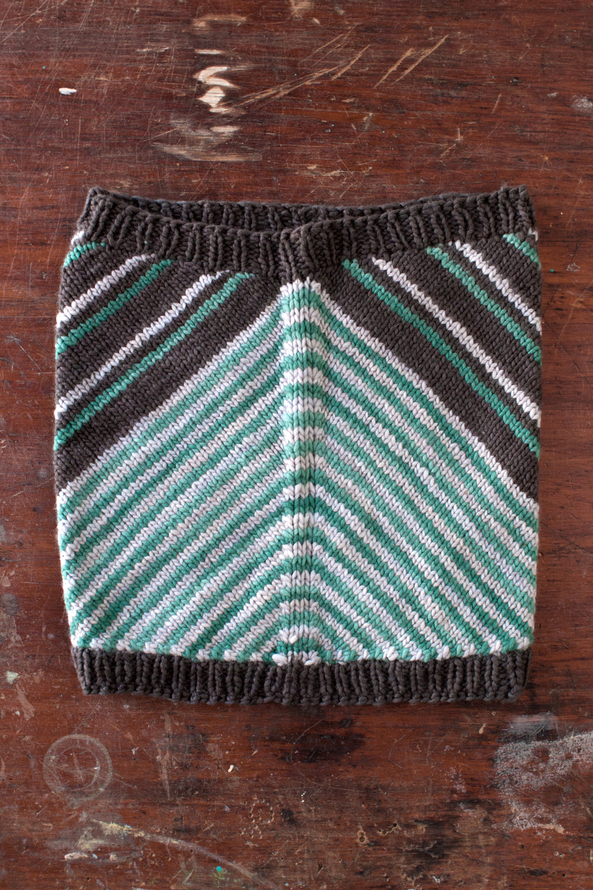 Fairmount Fibers Quoin 2015P pattern in vibrant colors, showcasing intricate design on soft yarn with detailed texture.