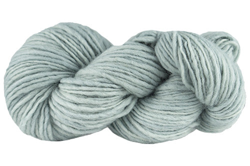 Manos del Uruguay Wool Clásica Draft yarn in soft, natural fibers with a subtle, textured appearance.