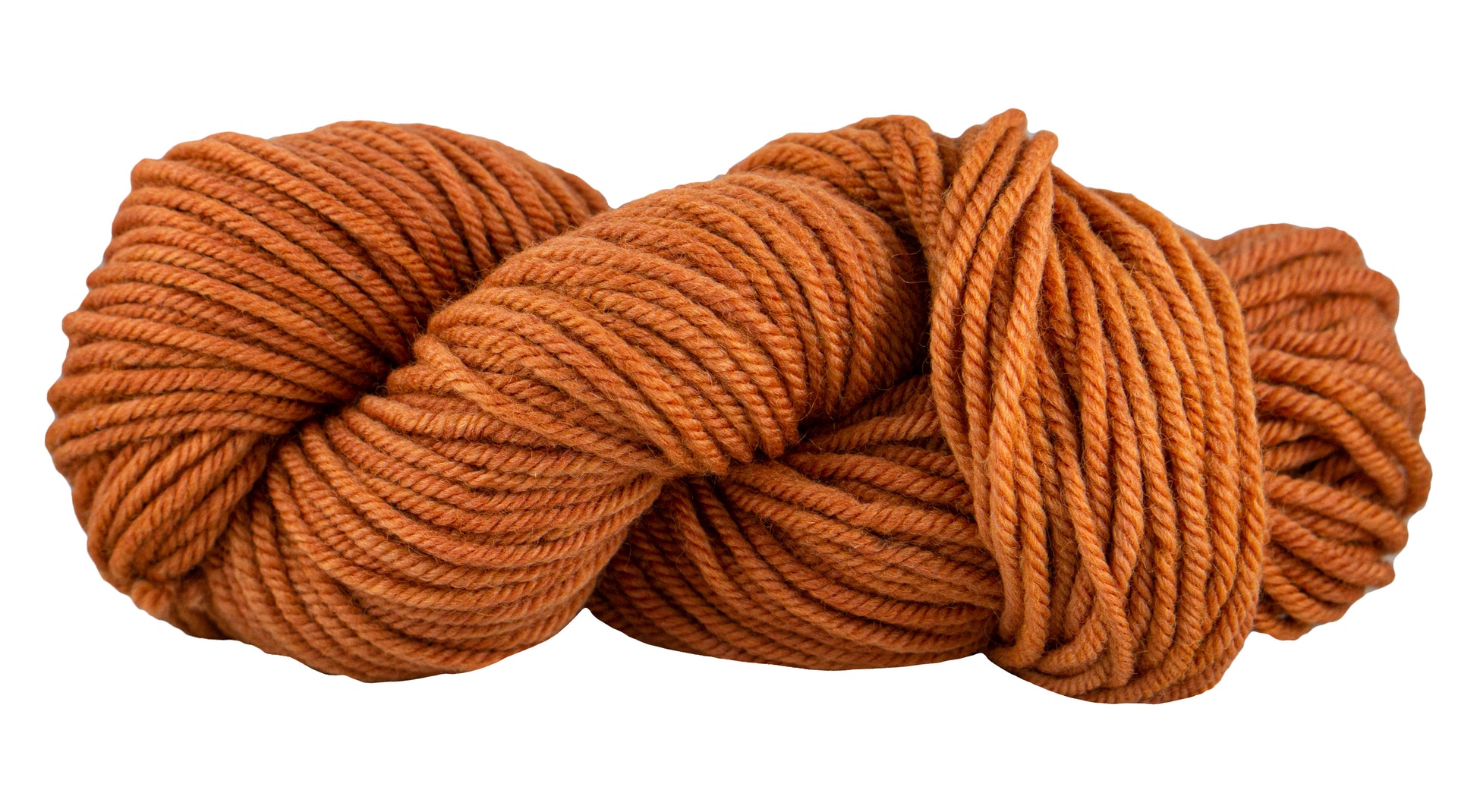 Manos del Uruguay Cardo yarn in Pumpkin color, soft and textured wool textile for knitting or crochet projects.